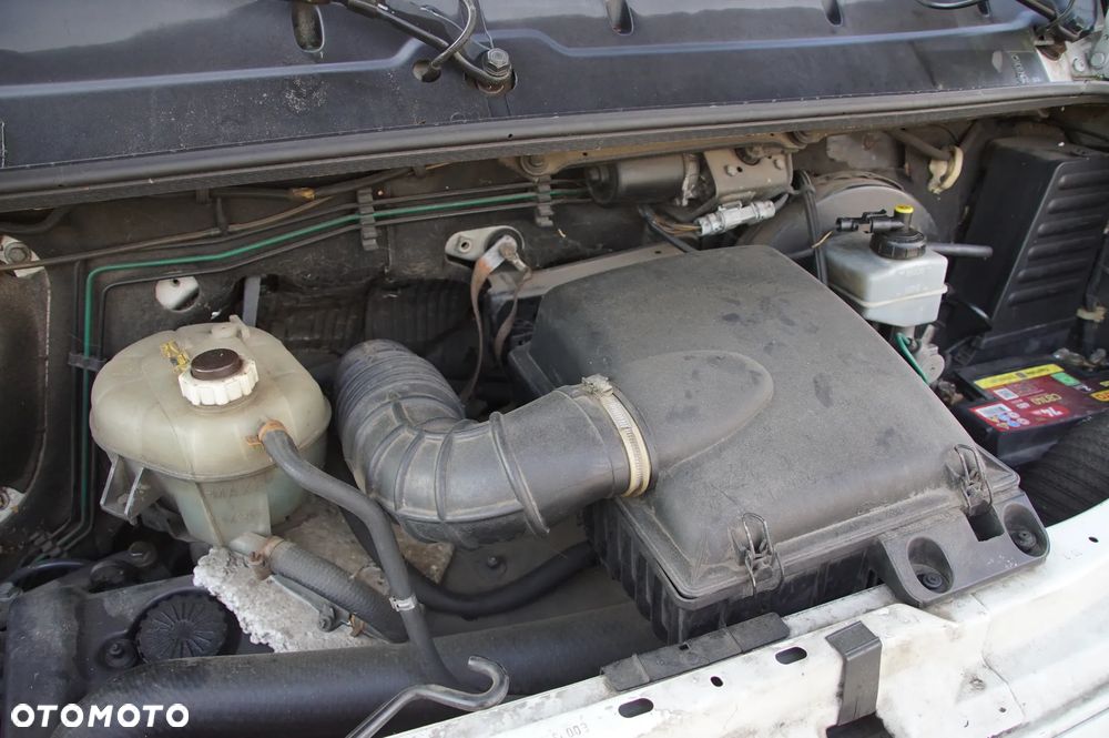 Auto na części - Opel Movano 1 I L2 2.8 DTI 114 KM S9W-702 M77 11U 2000R Silnik Skrzynia Drzwi Lusterka Szyba Maska Lampa Klamka Licznik Deska Kokpit Felga - 16