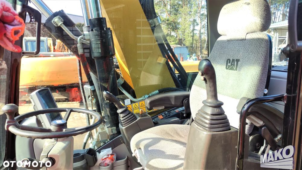 Caterpillar M313D - 11