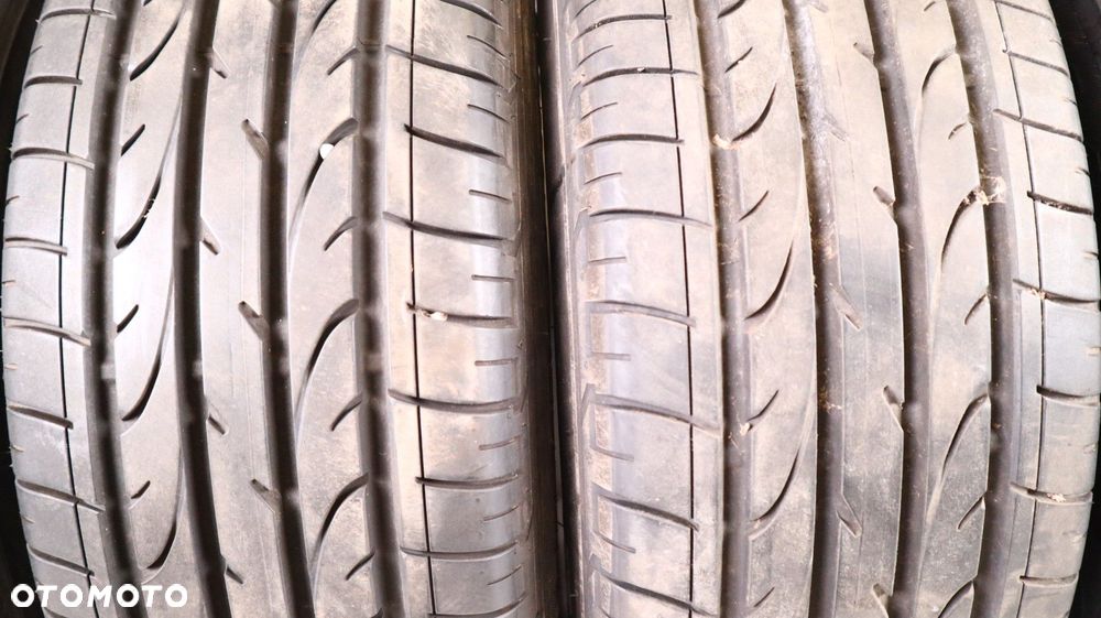 OPONY BRIDGESTONE DUELER H/P 215/65/16 - 11