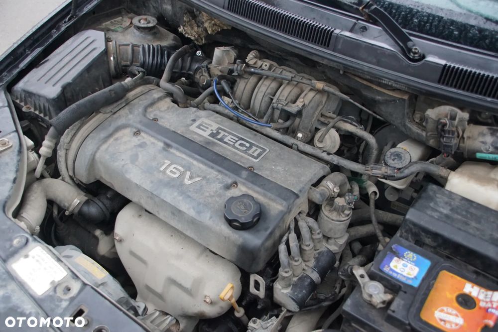 Auto na części - Daewoo Kalos 1.4 E-TEC II 94 KM F14D3 2005R Silnik Skrzynia Drzwi Maska Klapa Błotnik Zderzak Lampa Lusterko Klamka Deska Kokpit Sterownik Moduł Licznik Kierownica Panel - 16