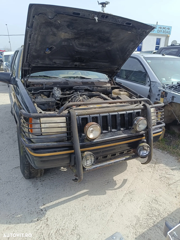Dezmembrez Jeep Grand Cherokee ZJ 5.2v84.0 benzina,2,5d