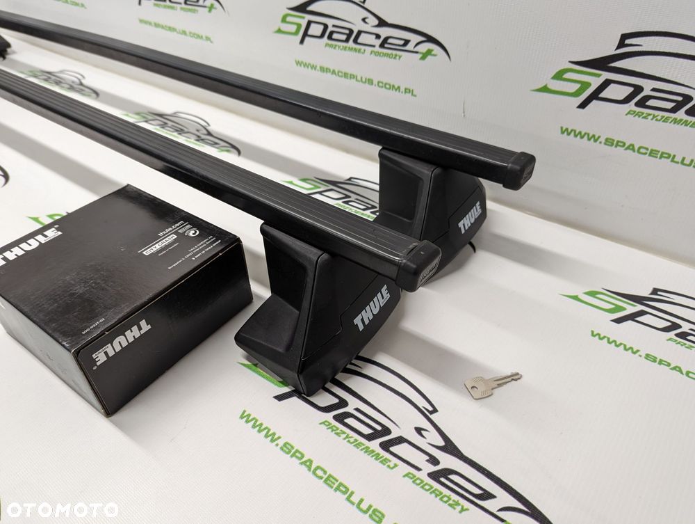 Bagażnik dachowy Thule: belki 7123 + Stopy 7105 + kit - 1