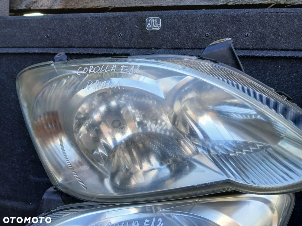 Toyota Corolla E12 lampa przednia prawa. - 1