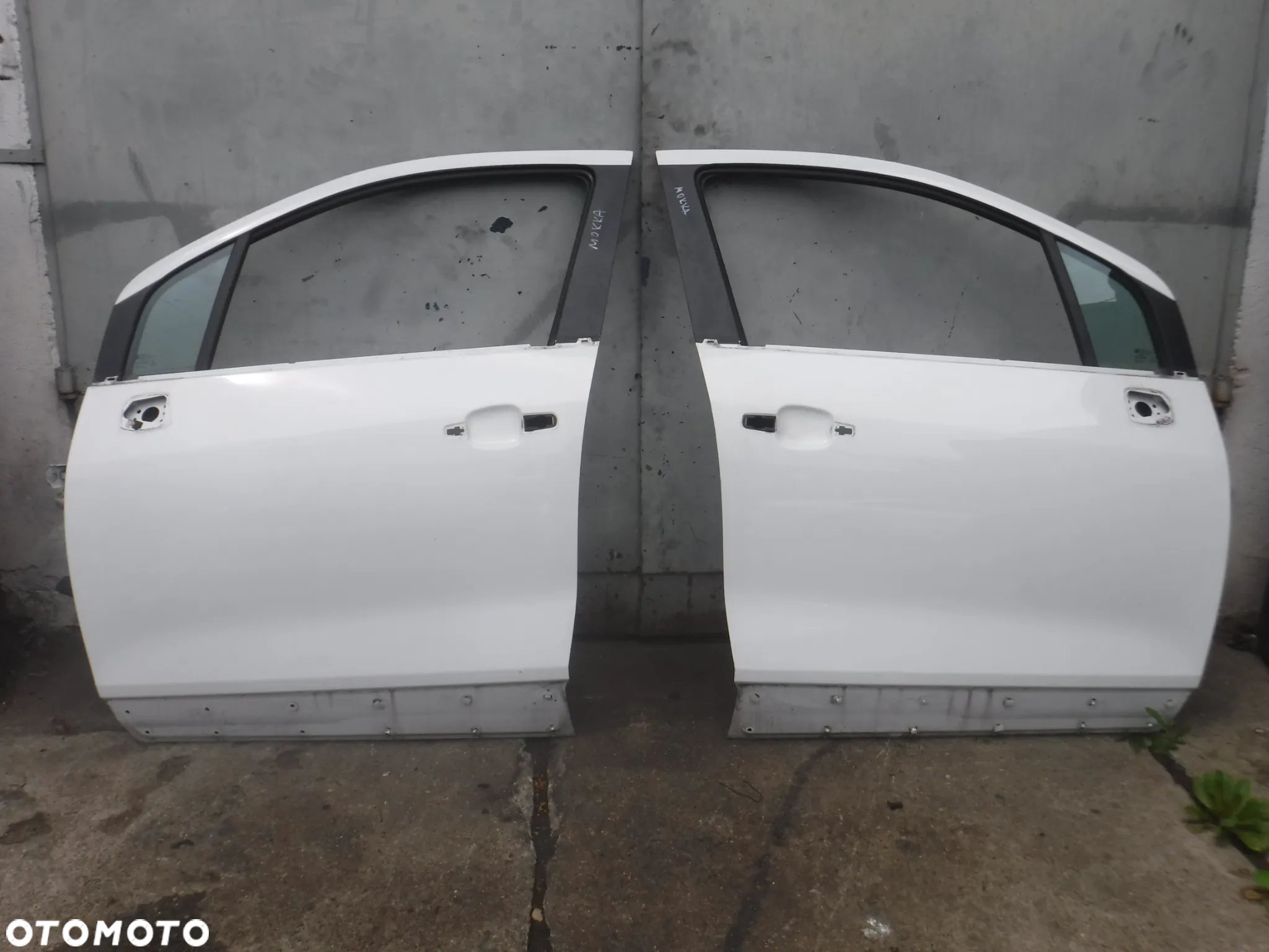 Opel Mokka  12-16 drzwi przod lewe  prawe lewe kolor GAZ - 9