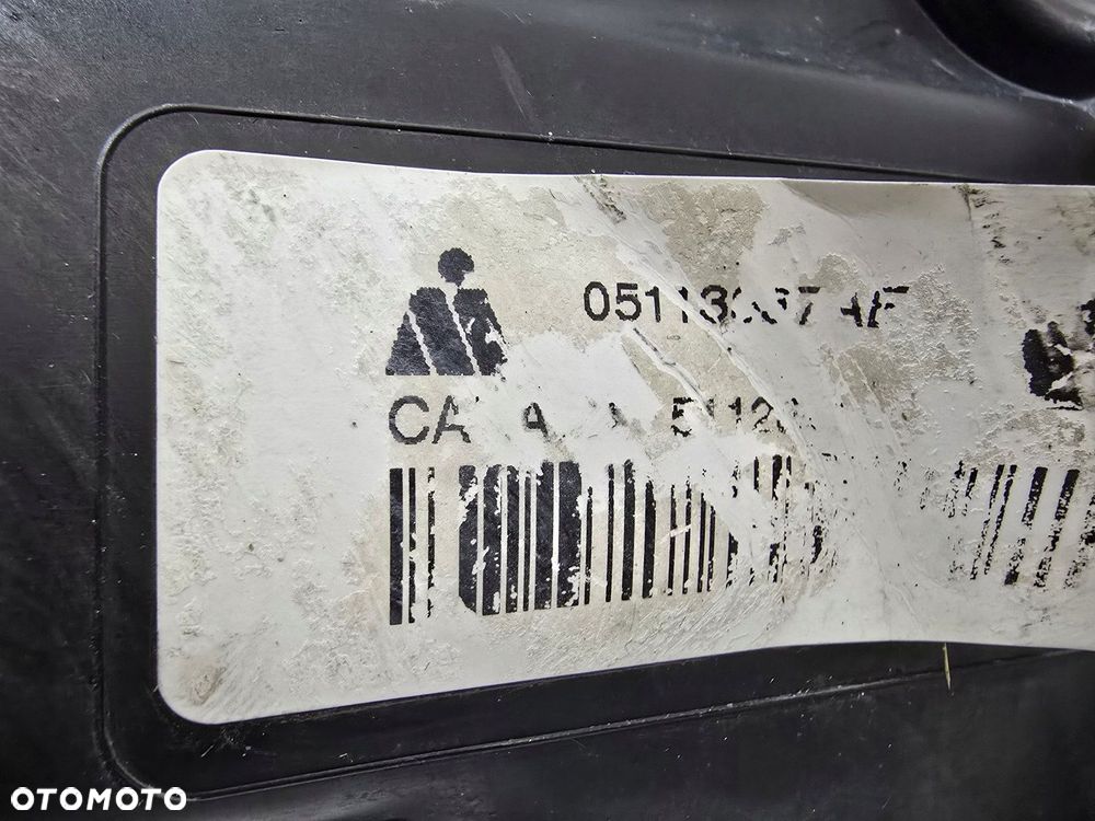 reflektor lampa przód lewy chrysler voyager town country usa 05113337ae - 6