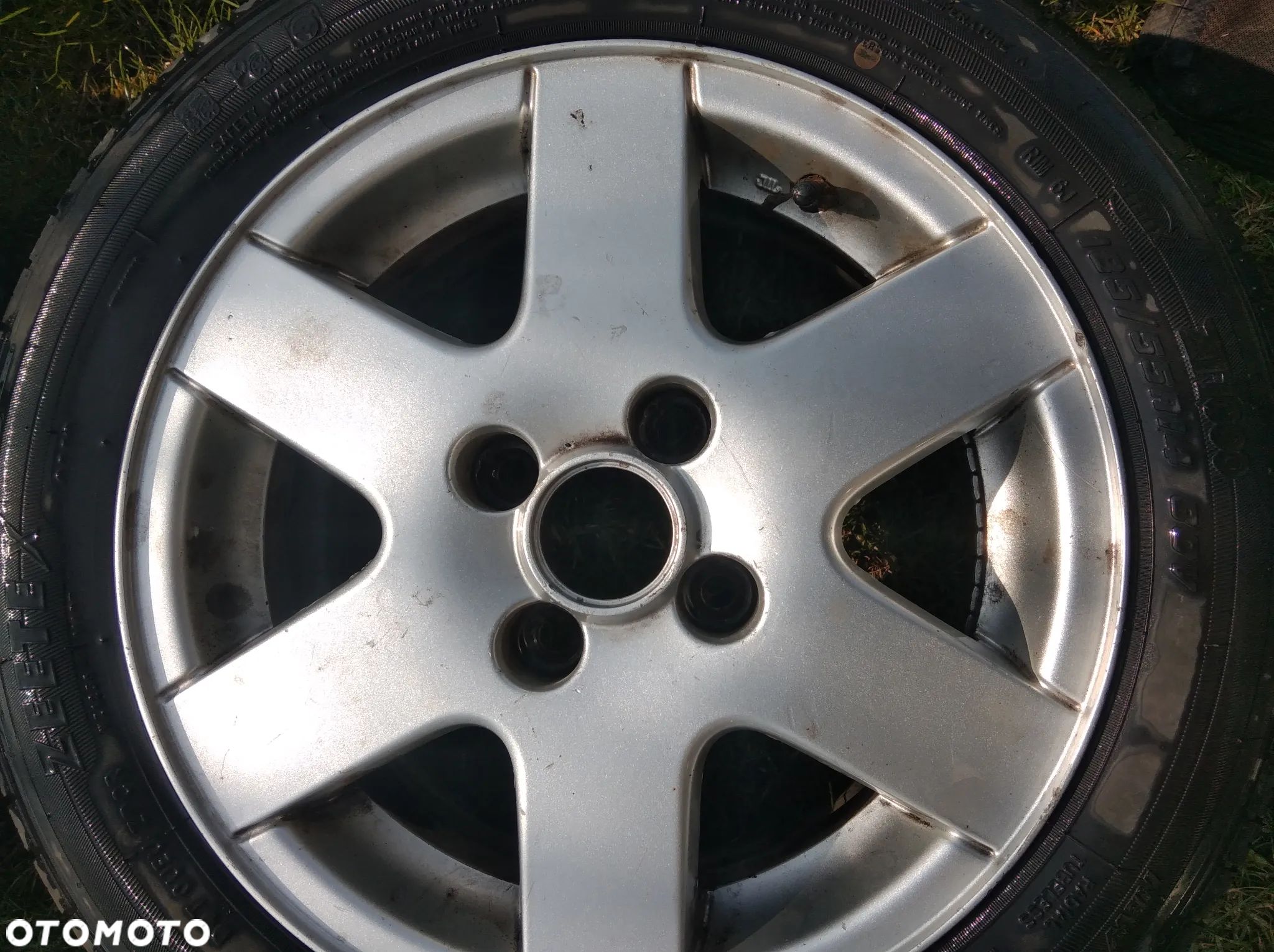 Koła aluminiowe VW 4x100x57 14 cali opony wielosezonowe - 1