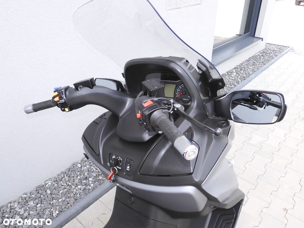 Suzuki Burgman - 7