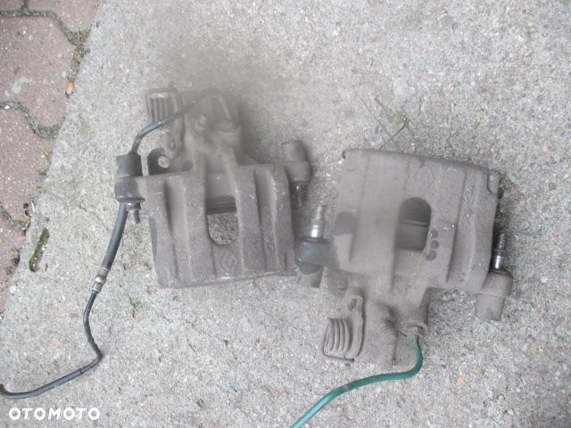 RENAULT LAGUNA 2 II zacisk tylny lewy prawy cena za 1 sztuke - 1