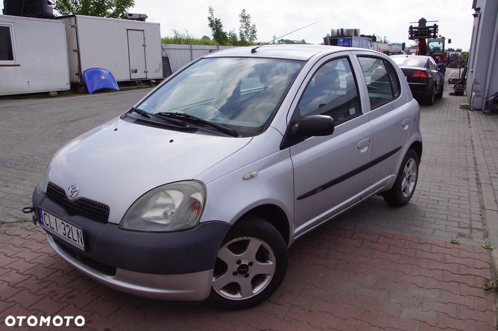 Auto na części - Toyota Yaris I 5D HB 1.0 VVTi 68 KM 1SZ-FE MTM 199 2001R Silnik Skrzynia Zderzak Maska Klapa Drzwi Szyba Klamka Deska Kokpit Sterownik Moduł Wyświetlacz - 7