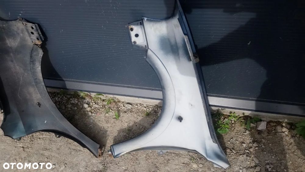 BŁOTNIK ASTRA II PRAWY LEWY PRZÓD - 5