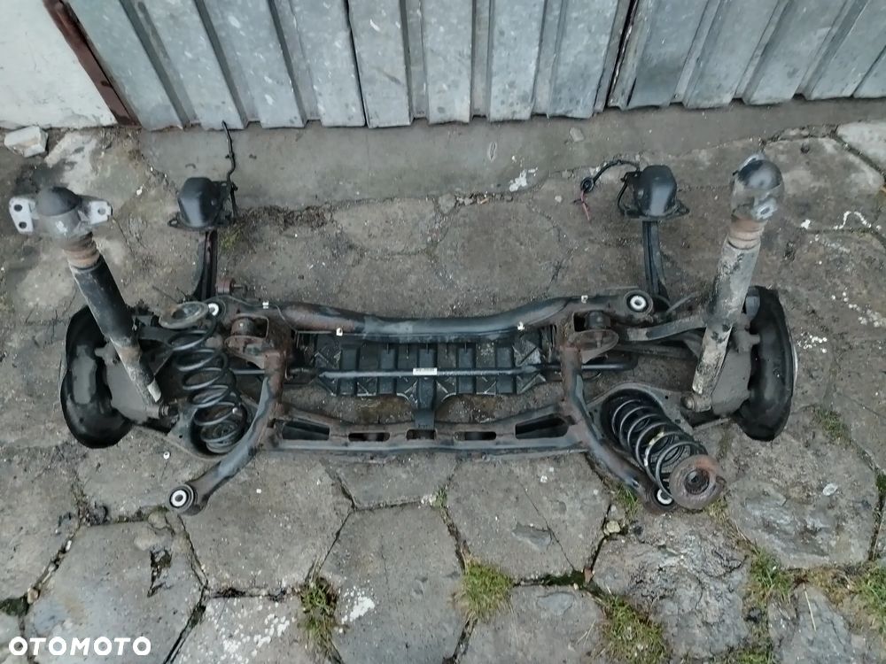 VW PASSAT B7 KOMBI ZAWIESZENIE TYŁ OŚ BELKA KOMPLETNE - 1