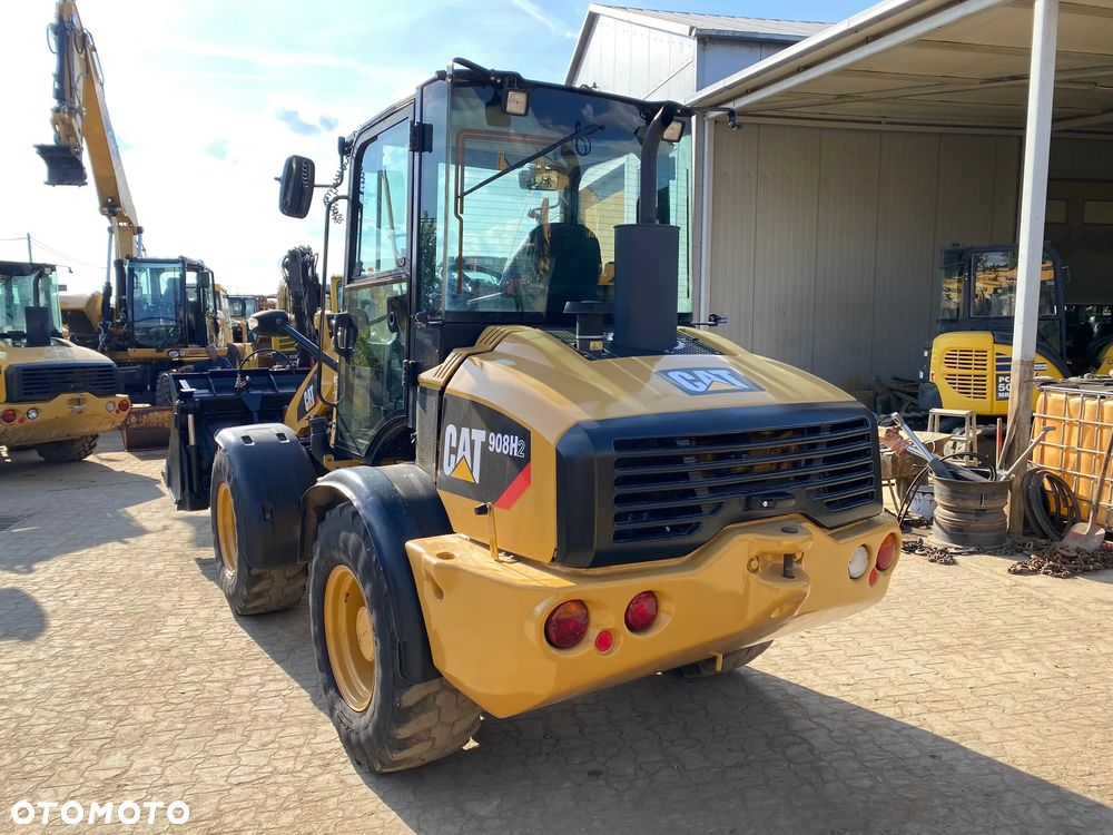 Caterpillar CAT 908H2, 2014 ROK, 6000 MTH, ŁYŻKA OTWIERANA + WIDŁY, z NIEMIEC, - 5