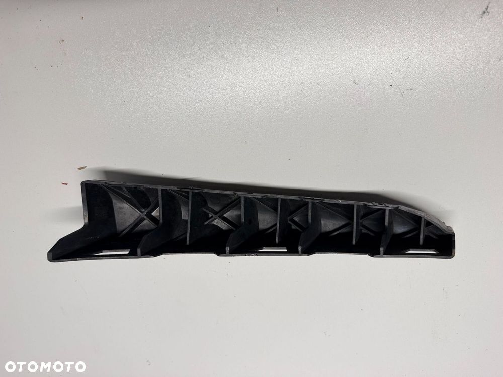 ŚLIZG ZDERZAKA LEWY LAMPĘ HYUNDI TUCSON II LIFT 19-21  86555-D7500 - 2