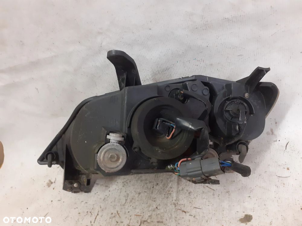 .  PRZOD PRZEDNIA LAMPA PRAWA MAZDA 2 DY - 3