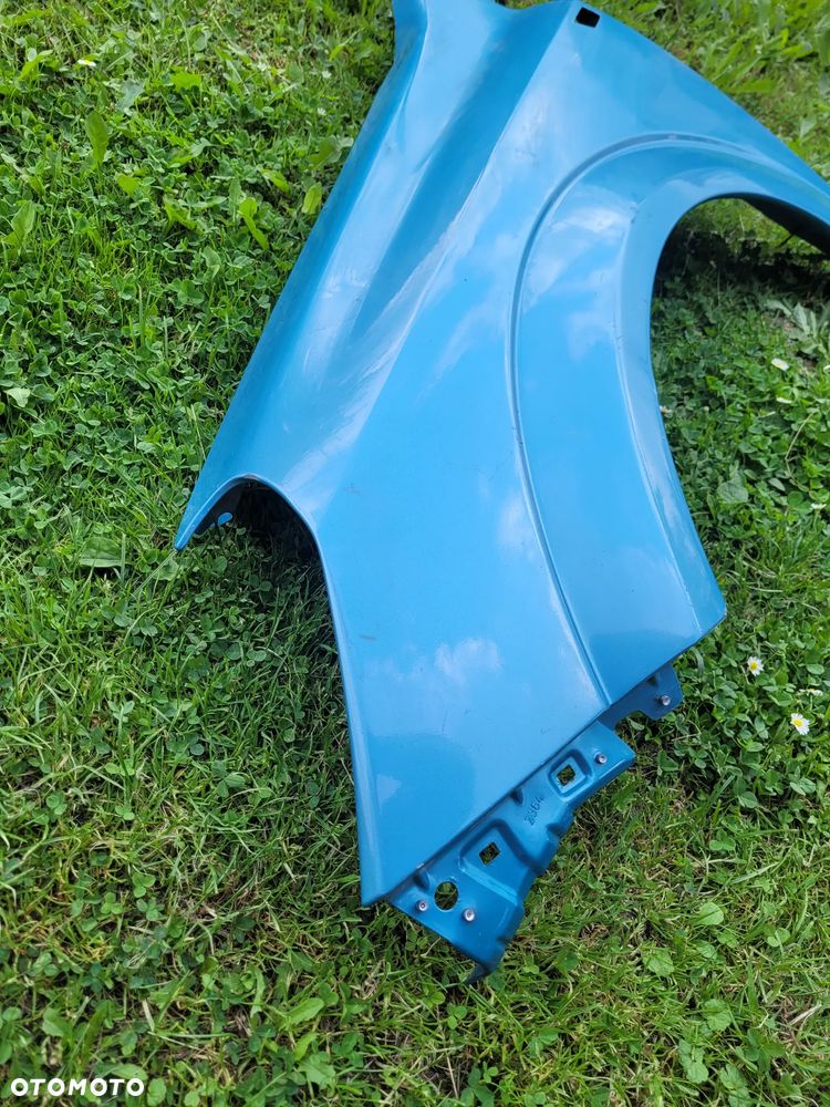 Astra H błotnik lewy - 2
