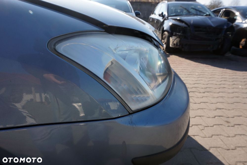 MASKA ZDERZAK BŁOTNIKI LAMPY COROLLA E12 8Q3  TOYOTA 2001-2004 SREBRNY PRZÓD KOMPLETNY - 17