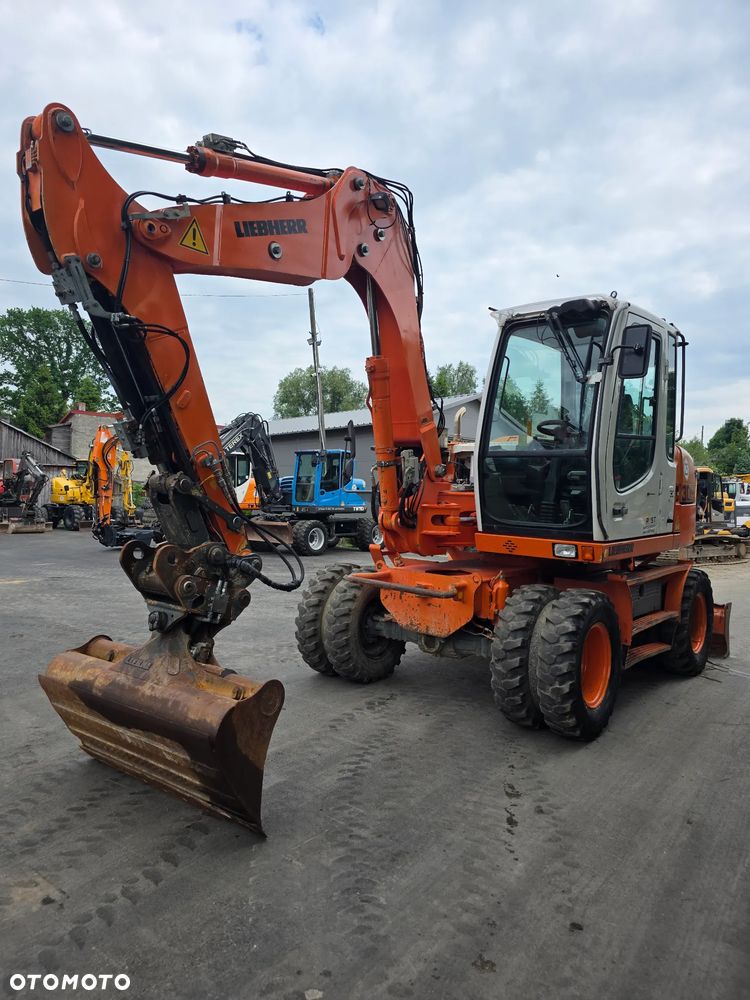 Liebherr A309 Litronic - 2