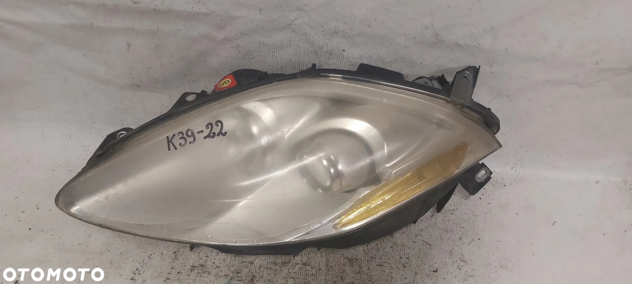 .  PRZOD PRZEDNIA LAMPA LEWA FIAT BRAVO 2 - 2