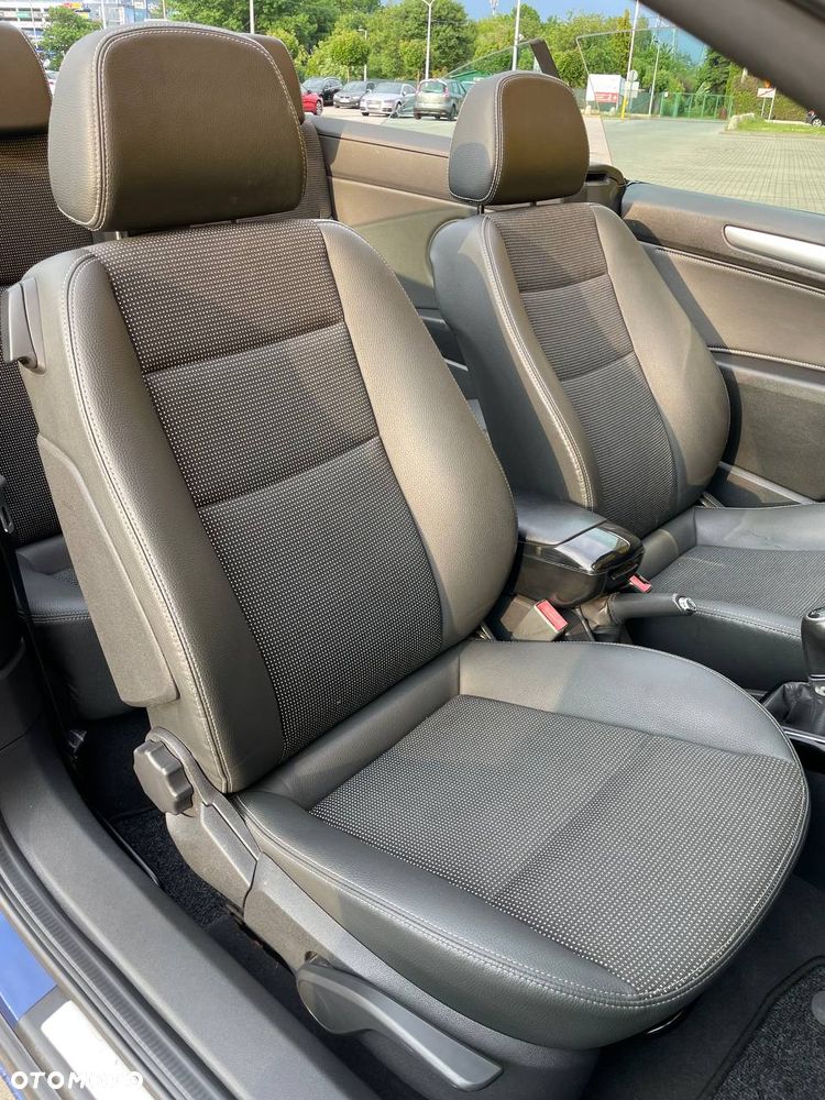 Opel Astra 1.6 Cosmo - 11