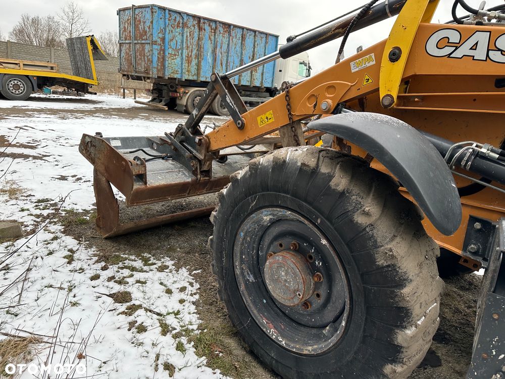 Case 695ST 580 Cat JCB - 4