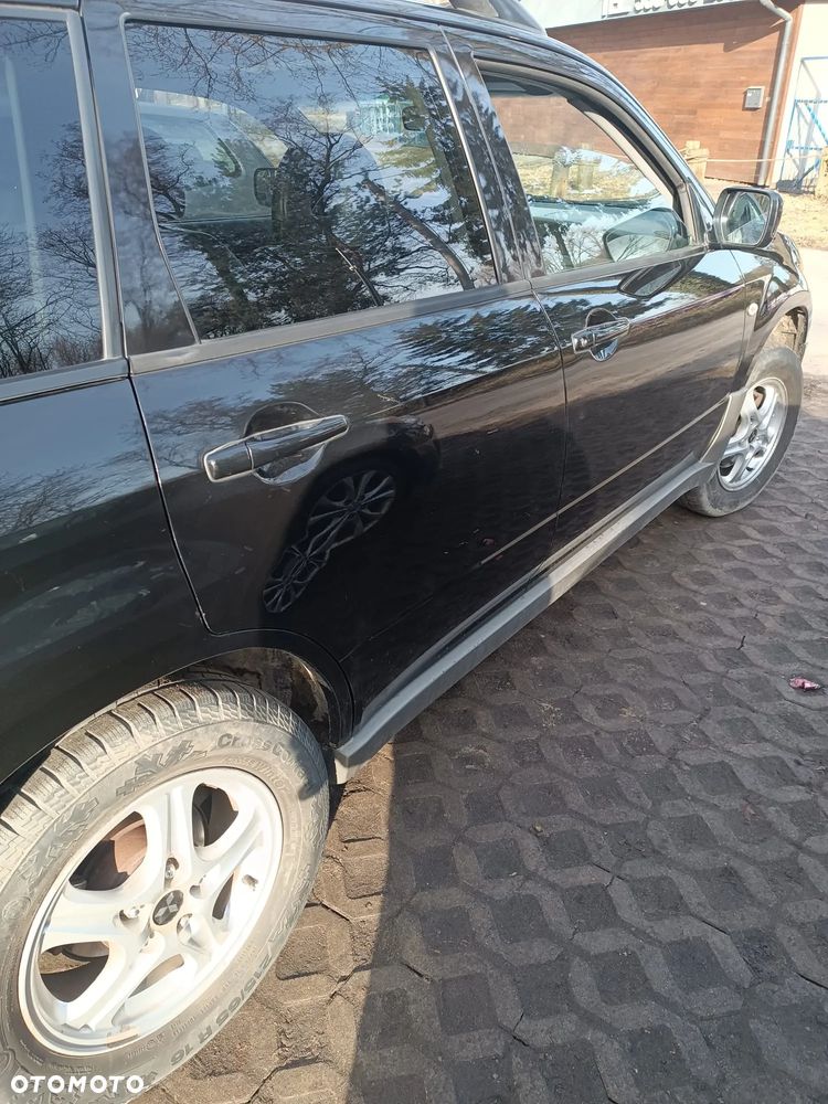 Mitsubishi Outlander 2.0 Comfort 4WD - 7