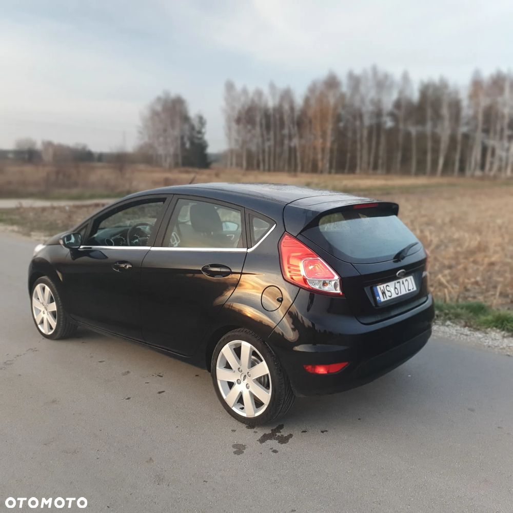 Ford Fiesta 1.25 Ghia - 9