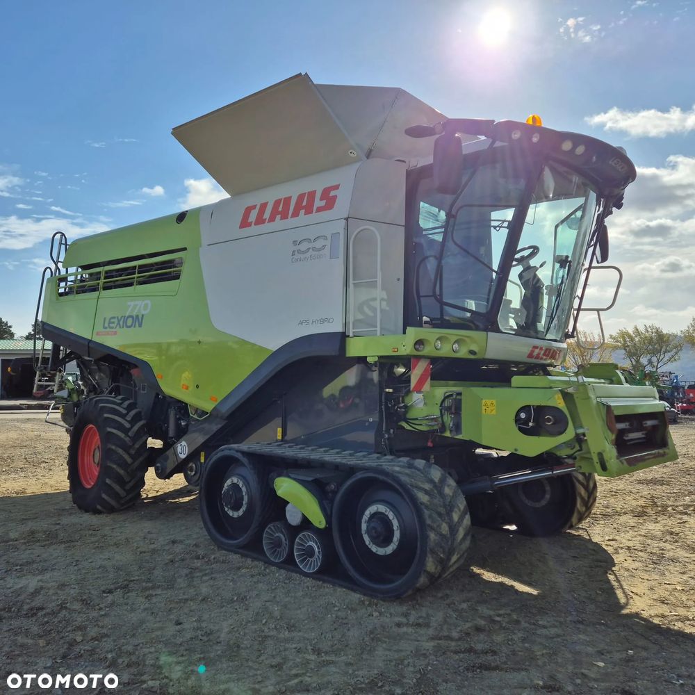Claas Lexion 770TT z hederem - 1