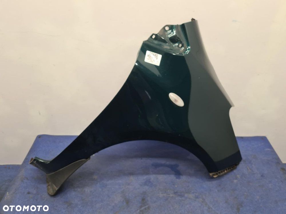 TOYOTA YARIS II LIFT BŁOTNIK PRZÓD PRAWY 6S3 - 1