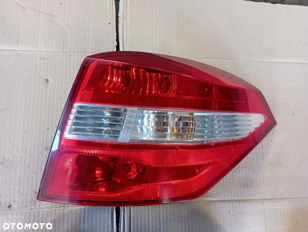 RENAULT LAGUNA III 3 KOMBI LAMPA PRAWA TYŁ TYLNA EUROPA - 1