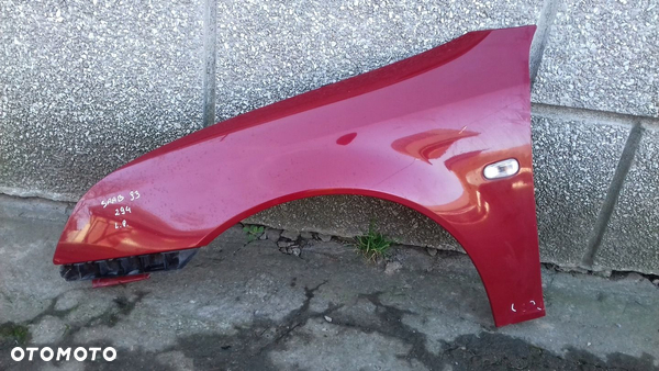 BŁOTNIK LEWY PRZÓD PRZEDNI SAAB 93 9-3 II 02-07 LAK. 294