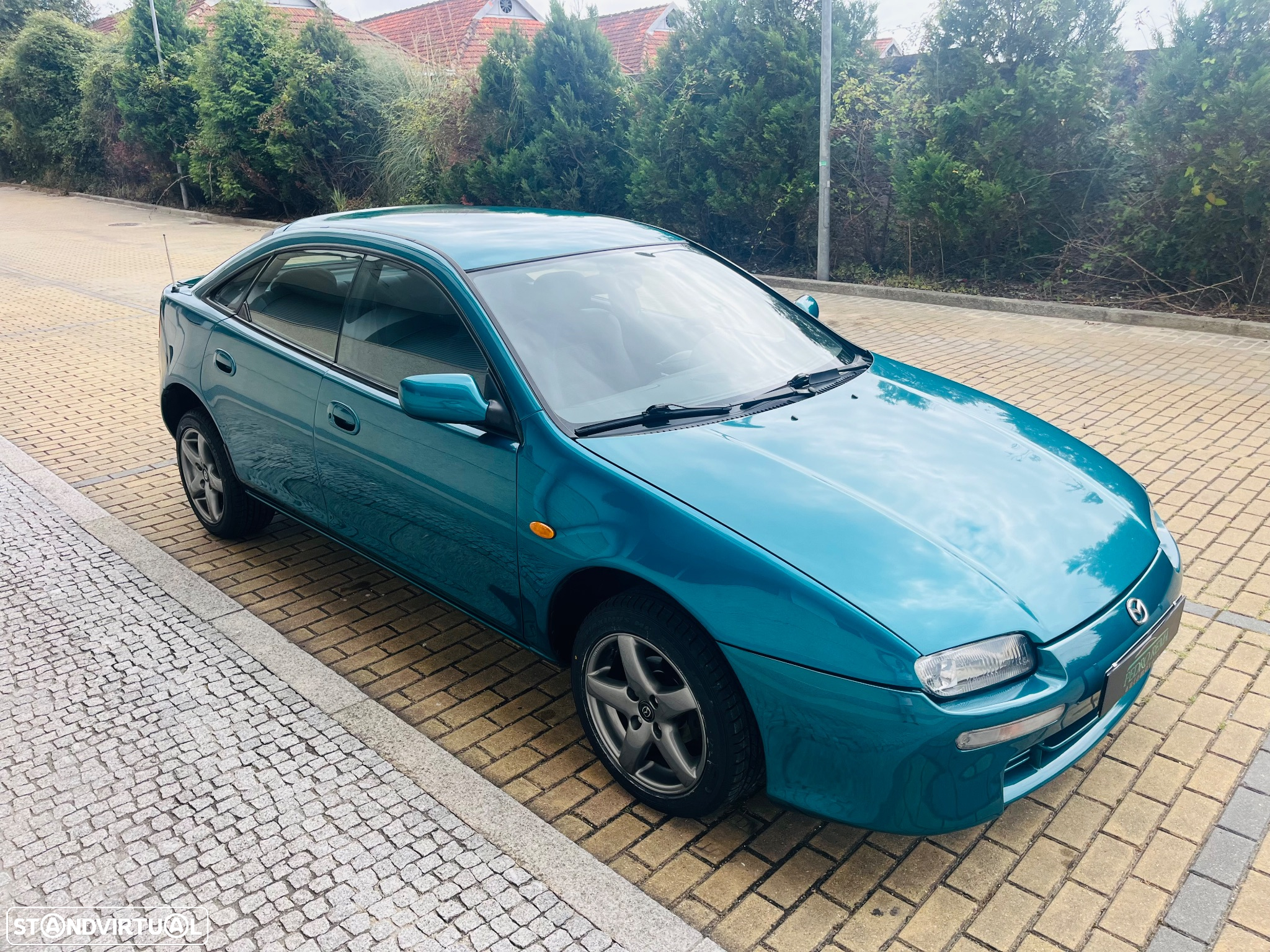 Mazda 323 F 1.5 - 12
