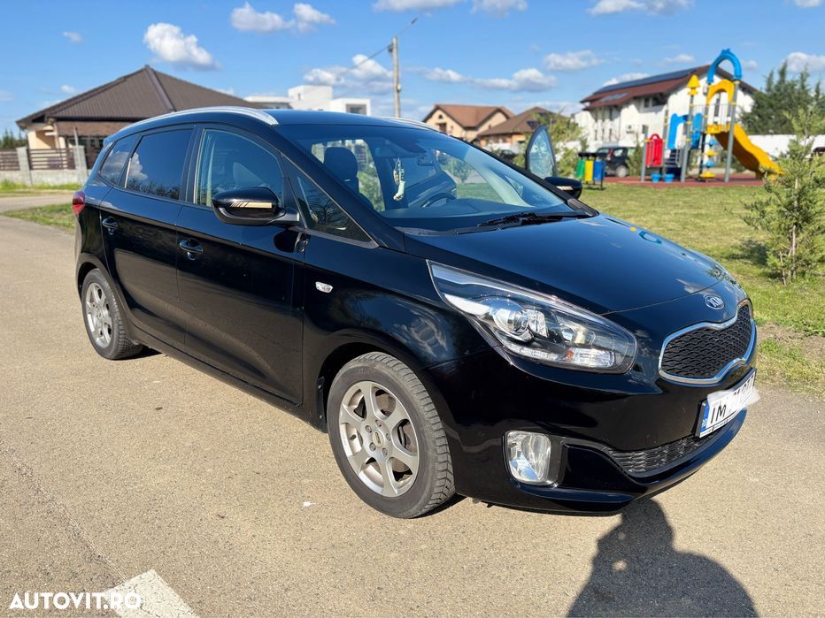 Kia Carens - 4