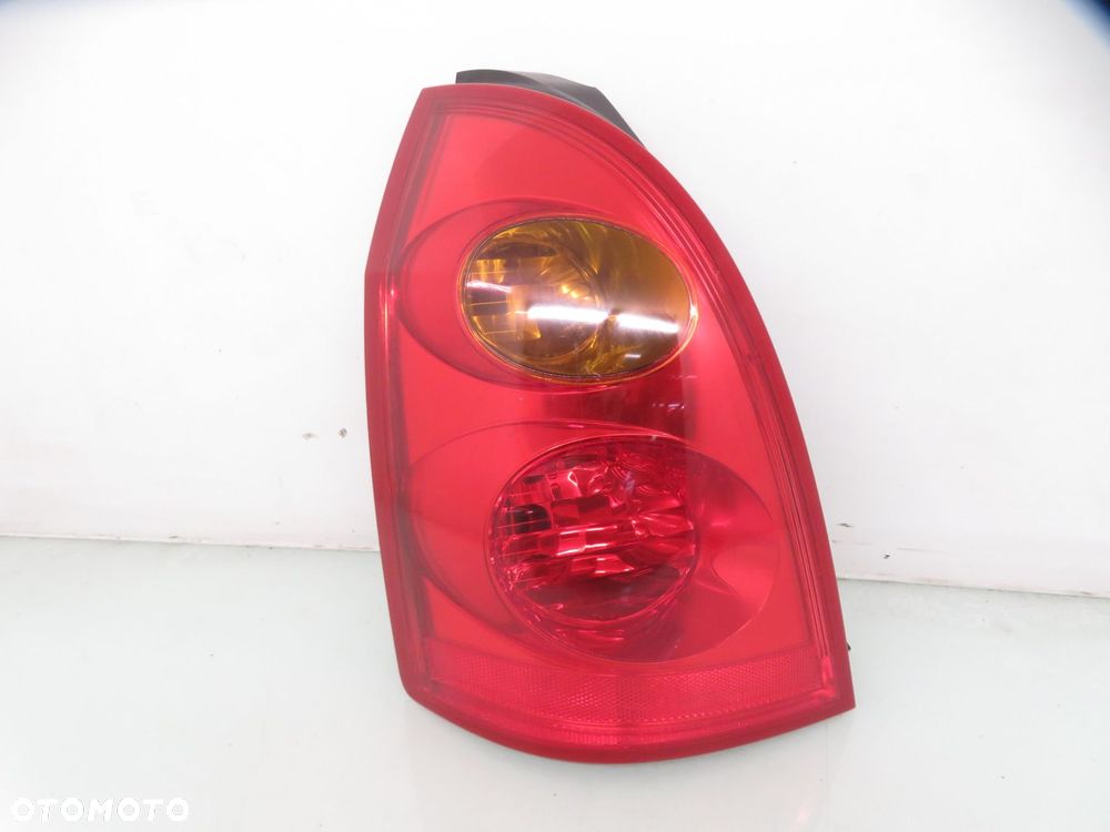 LAMPA LEWA TYLNA NISSAN PRIMERA P12 KOMBI  89077086 - 1