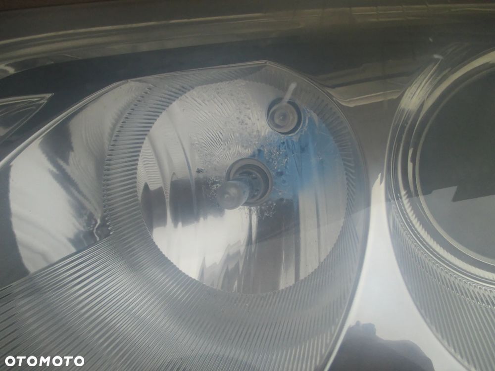 lampa lewa VW Passat B5 lift Hella Europa - 2