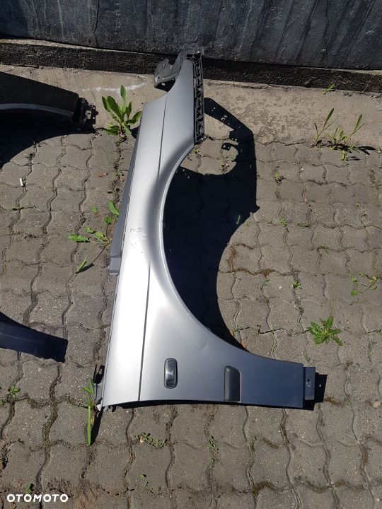 błotnik prawy przód saab 95