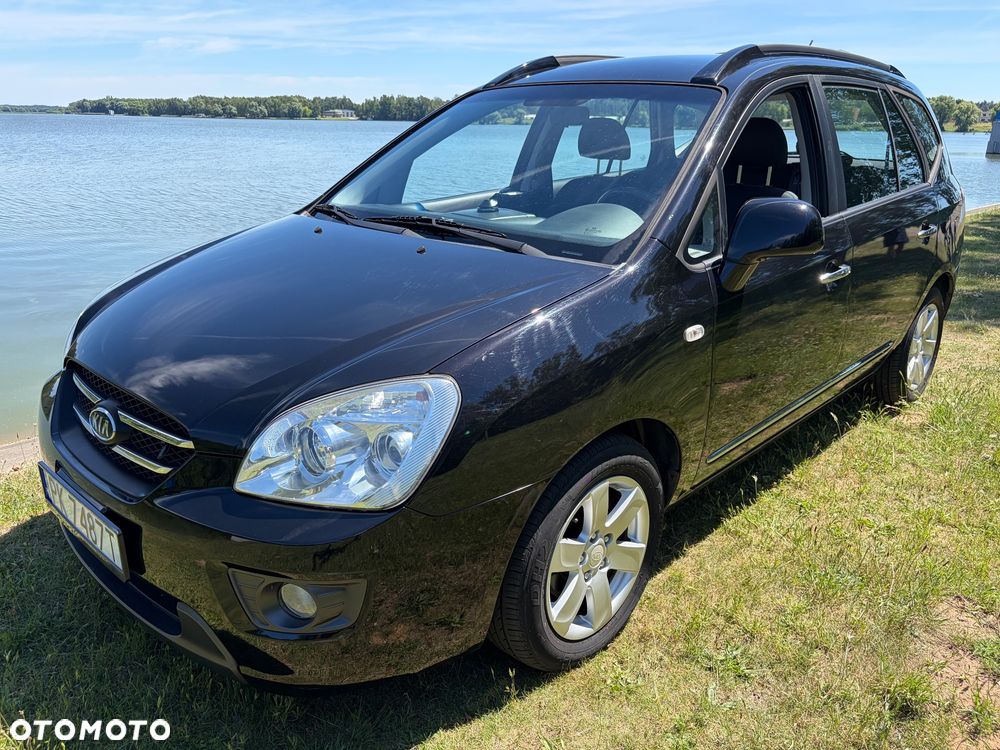 Kia Carens 2.0 CVVT EX Top - 1