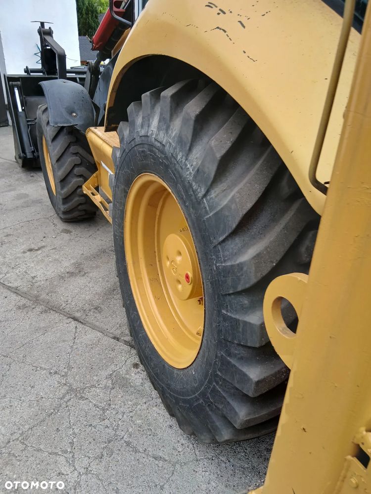 Caterpillar 428 E - 7