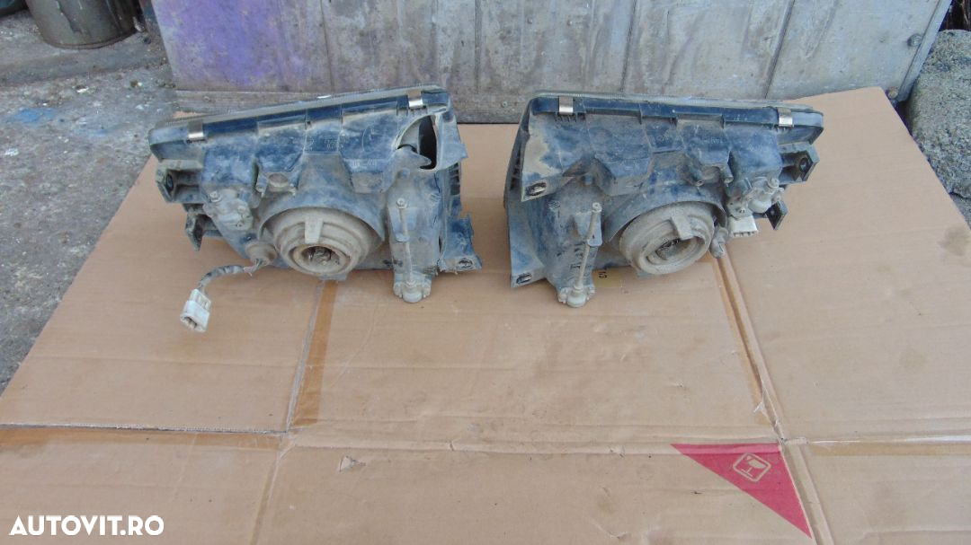 Far Dreapta mitsubishi Pajero 2 faruri stanga dreapta dezmembrez pajero 2.8 - 2