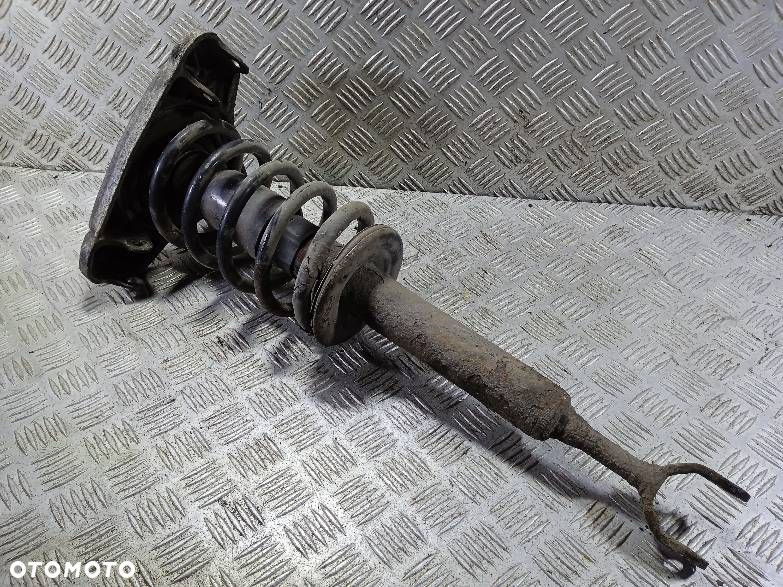 AMORTYZATOR LEWY PRZEDNI SPRĘŻYNA VOLKSWAGEN PASSAT B5