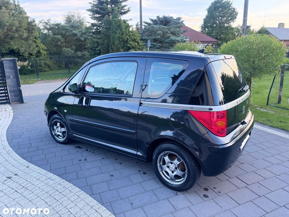 Peugeot 1007 1.4 Trendy - 8