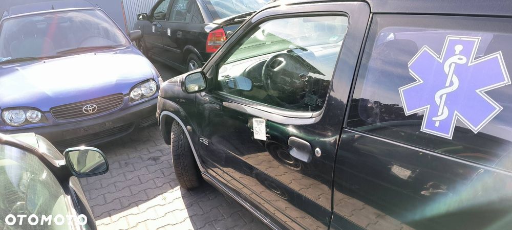 DRZWI LEWE PRZÓD SUZUKI IGNIS 2001 - 12