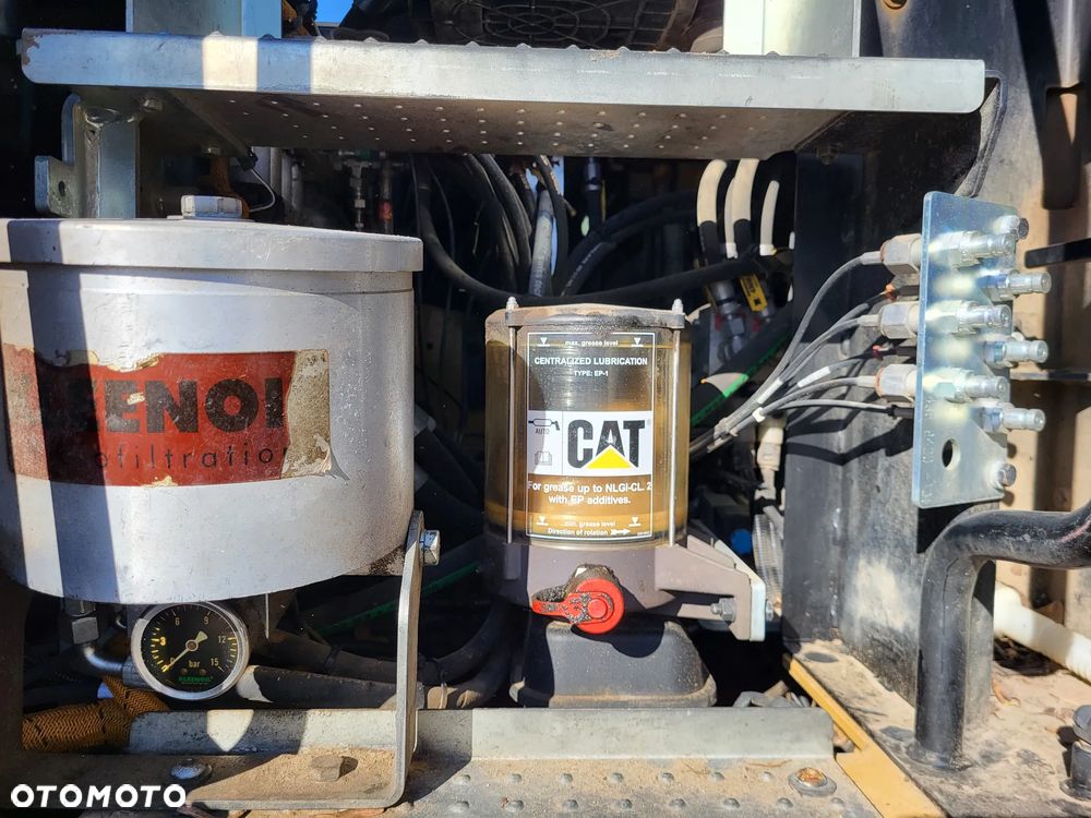 Caterpillar M 318F / z Niemiec /  9300 mth / - 11