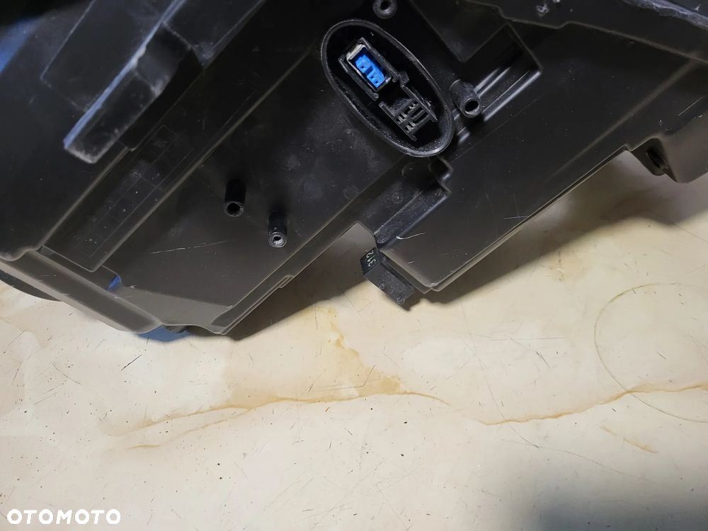 Opel Astra 4 J prawa bixenon - 4