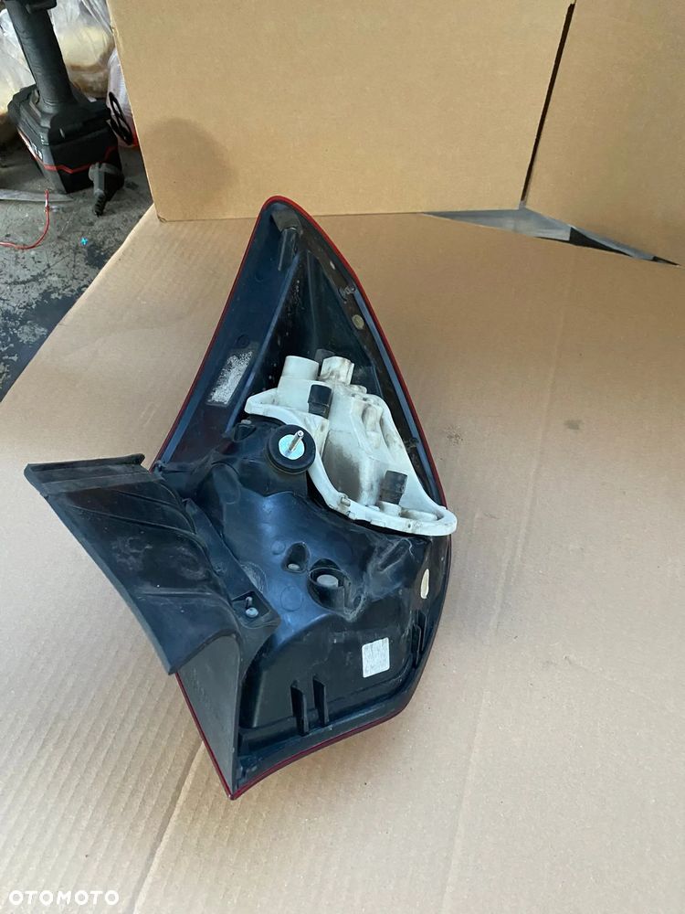 LAMPA LEWA TYŁ TYLNIA OPEL ASTRA J HB - 2