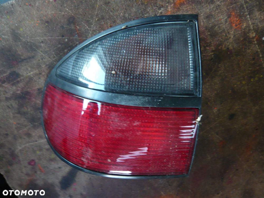 lampa lewa tylna 7701038275 renault laguna - 1