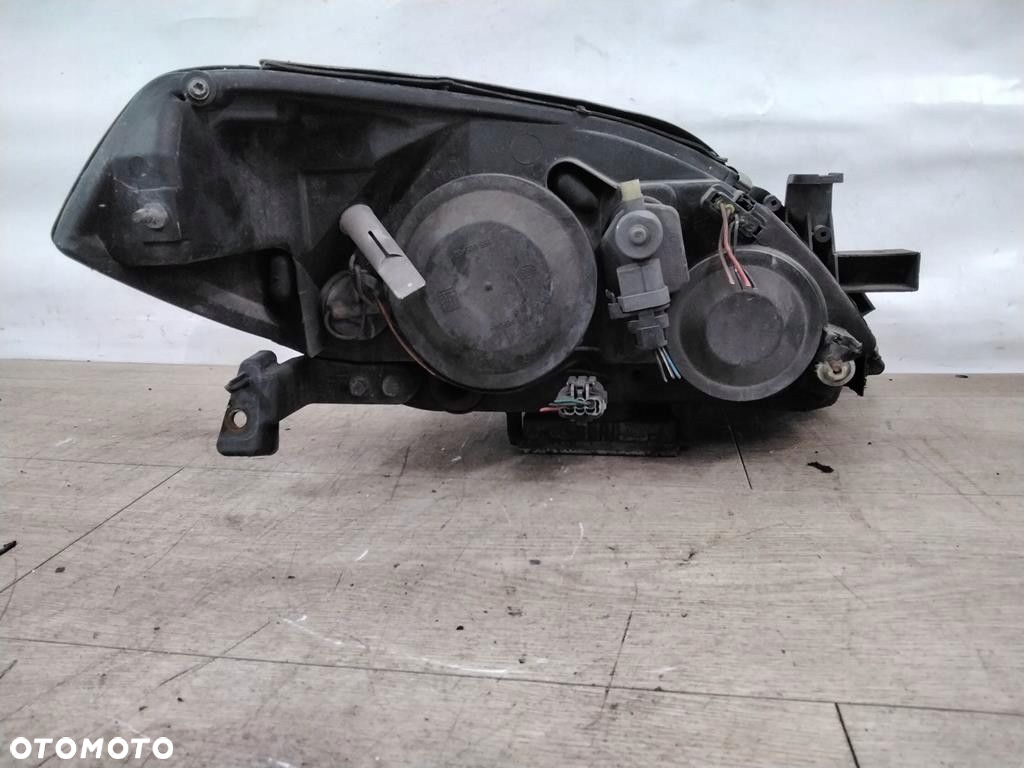 NISSAN PRIMERA P12 XENON LAMPA PRZÓD LEWA - 2