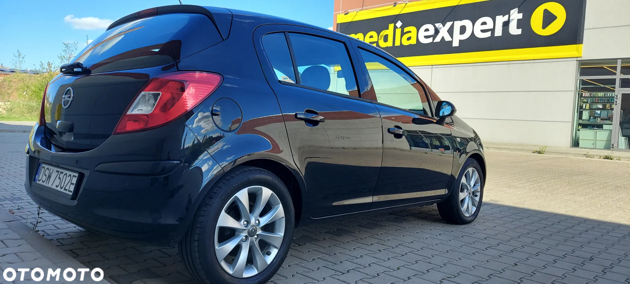 Opel Corsa 1.4 16V Cosmo - 7
