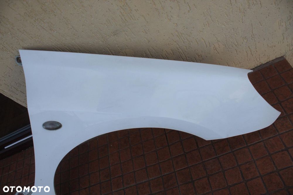 BŁOTNIK PRAWY PRZEDNI PRZÓD PEUGEOT 307 - 2