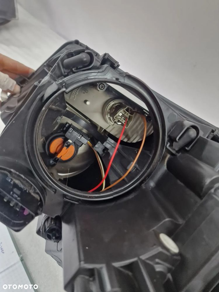VW T5 LIFT 7E0 MULTIVAN 10- PRAWA ZWYKŁA LAMPA PRZEDNIA PRZÓD , NR 7E1941016J , NR AUKCJI LA63 - 17