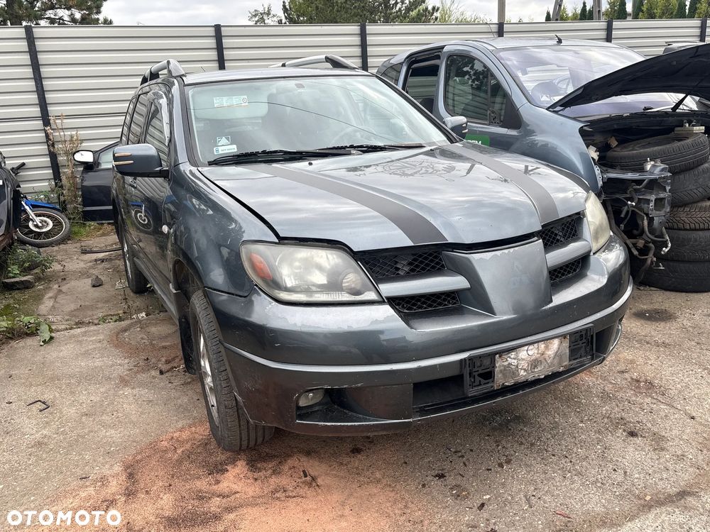 MASKA MITSUBISHI OUTLANDER 2003R LAKIER T12 - 2